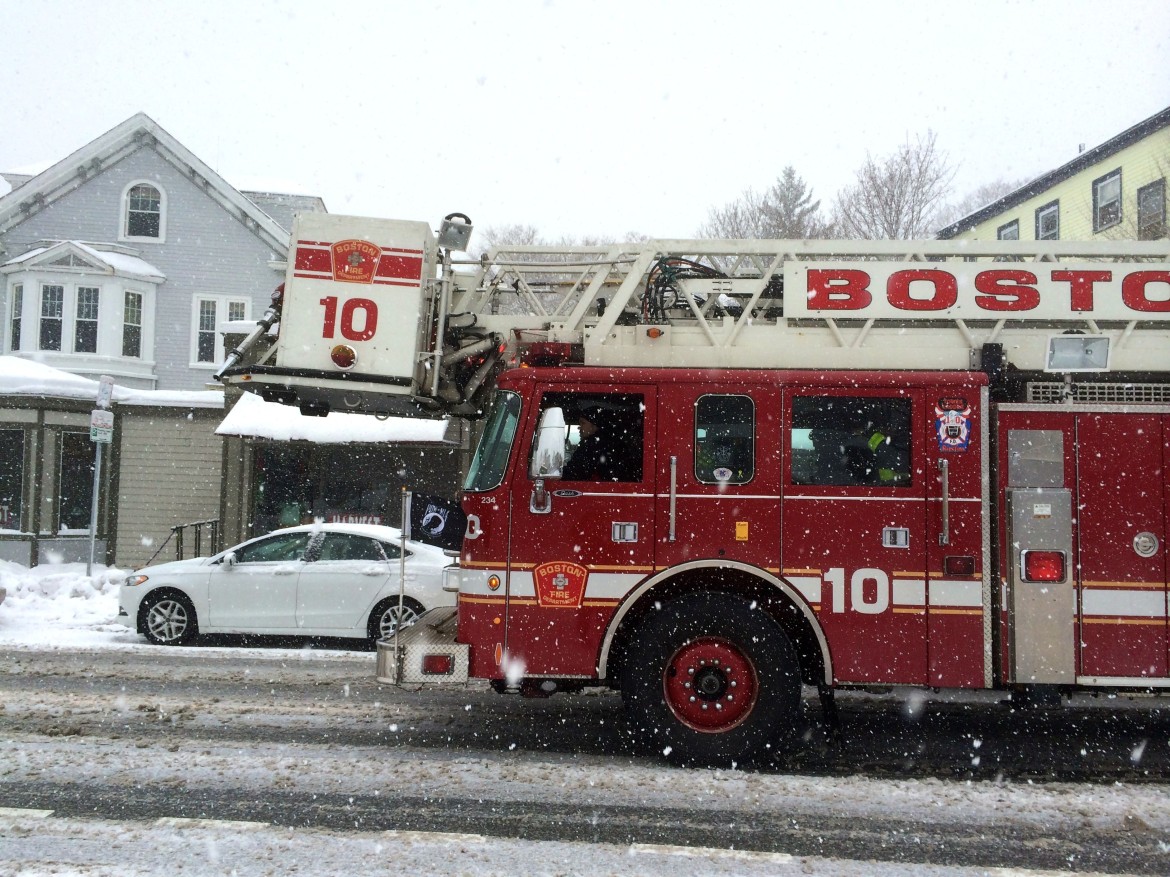 JP-based Ladder 10 of the Boston Fire Department responds to a call on Feb. 18, 2014.