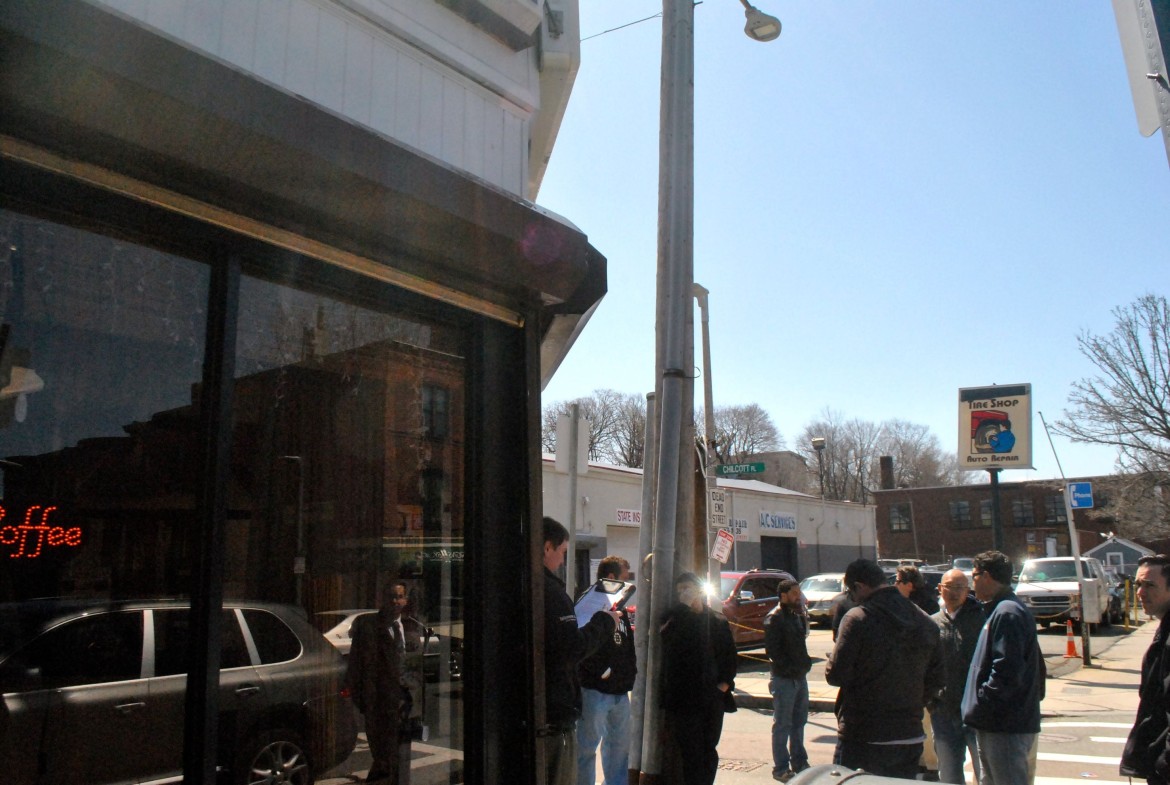 An open-air street auction for 3152-3160 Washington St., held April 16, 2014.