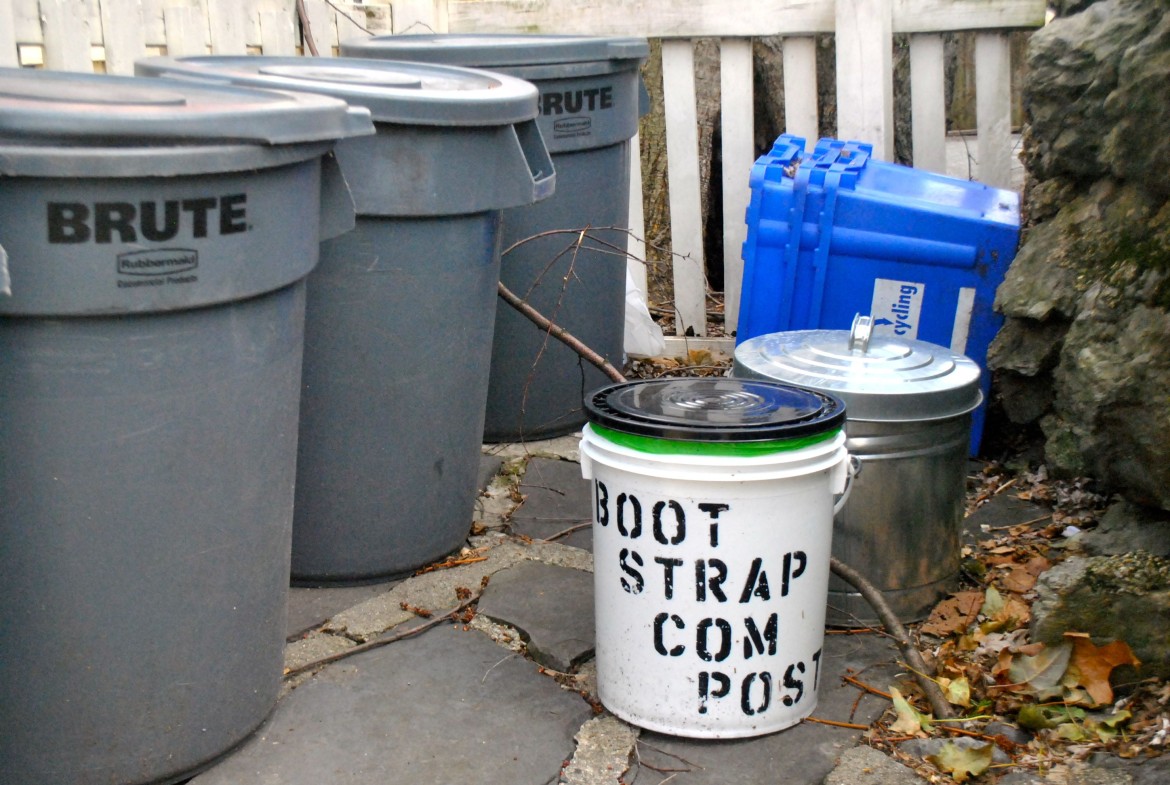 A Bootstrap Compost bucket outside a Jamaica Plain home.
