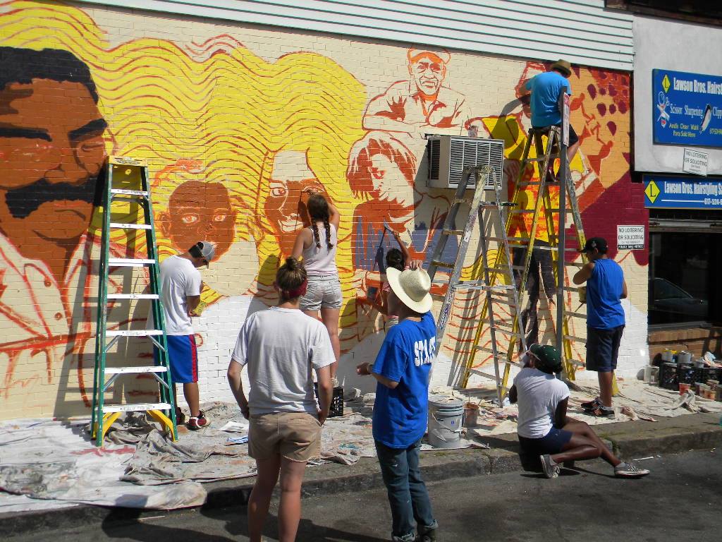 Mural painting underway on Weld Avenue in Egleston Square on July 14, 2014. This is replacing an older mural painted 15 years ago.