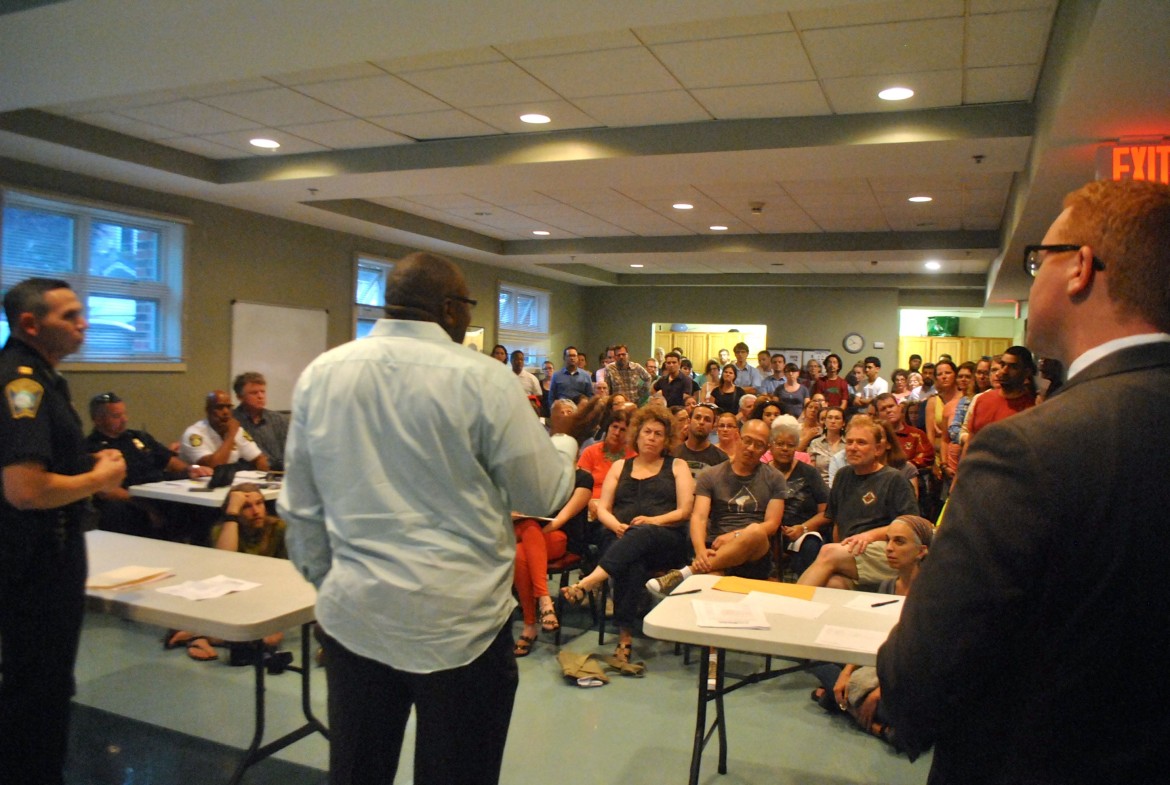 Police and politicians answered questions about crime in a packed room at the Nate Smith House on Monday, July 21, 2014.