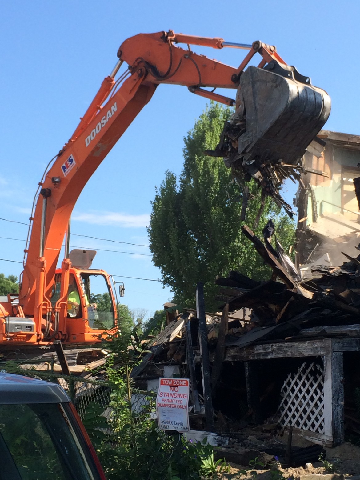 Demolition crews at work on Asticou Road on Friday, July 11, 2014.