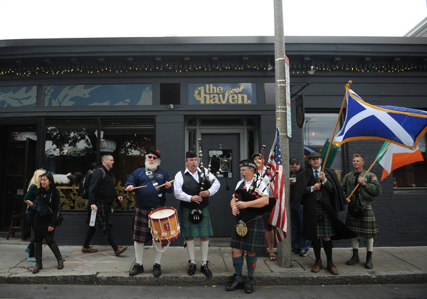 Drummer Peter Stewart and bagpipers Brian Miller and Tom Childs play in front of The Haven during the first annual "Angry Scotsman" Kilt Crawl through Jamaica Plain, Sept. 13, 2014. Participants in the event, which was a benefit for the Scots' Charitable Society and Charitable Irish Society, walked through Jamaica Plain, stopping at four local establishments; Eugene O'Neill's, James's Gate, Costello's, and The Haven.