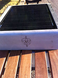 Graffiti on solar bench at Jamaica Pond