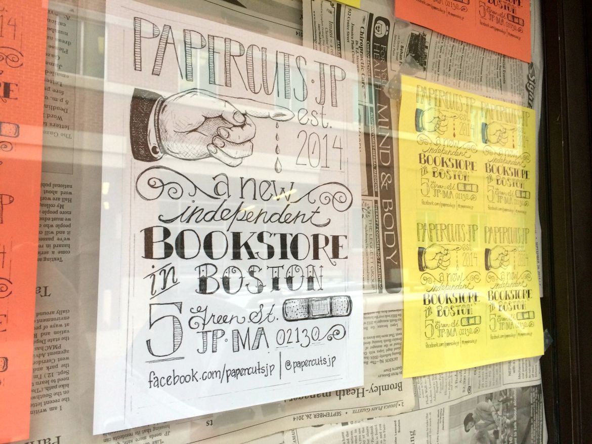 Paper covers the door at Papercuts, JP's newest bookstore. The 5 Green St. shop opens Saturday, Nov. 29, 2014.