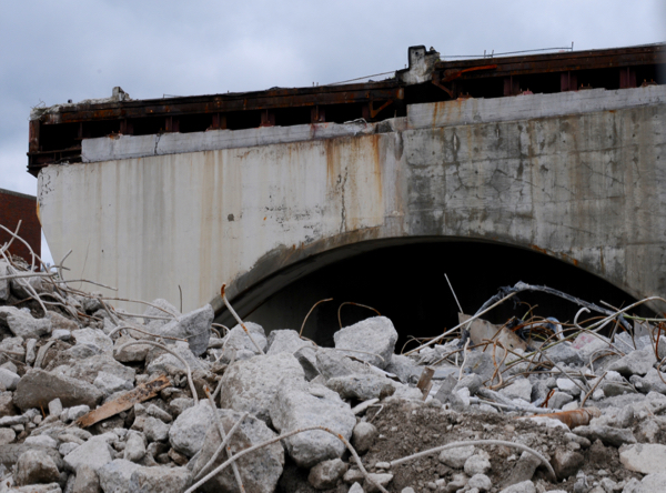 Concrete and rebar remains from the razing of the Casey Overpass, Monday, June 29, 2015.