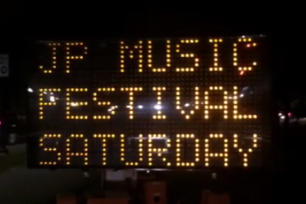 Jamaica Plain Music Festival sign on Jamaicaway