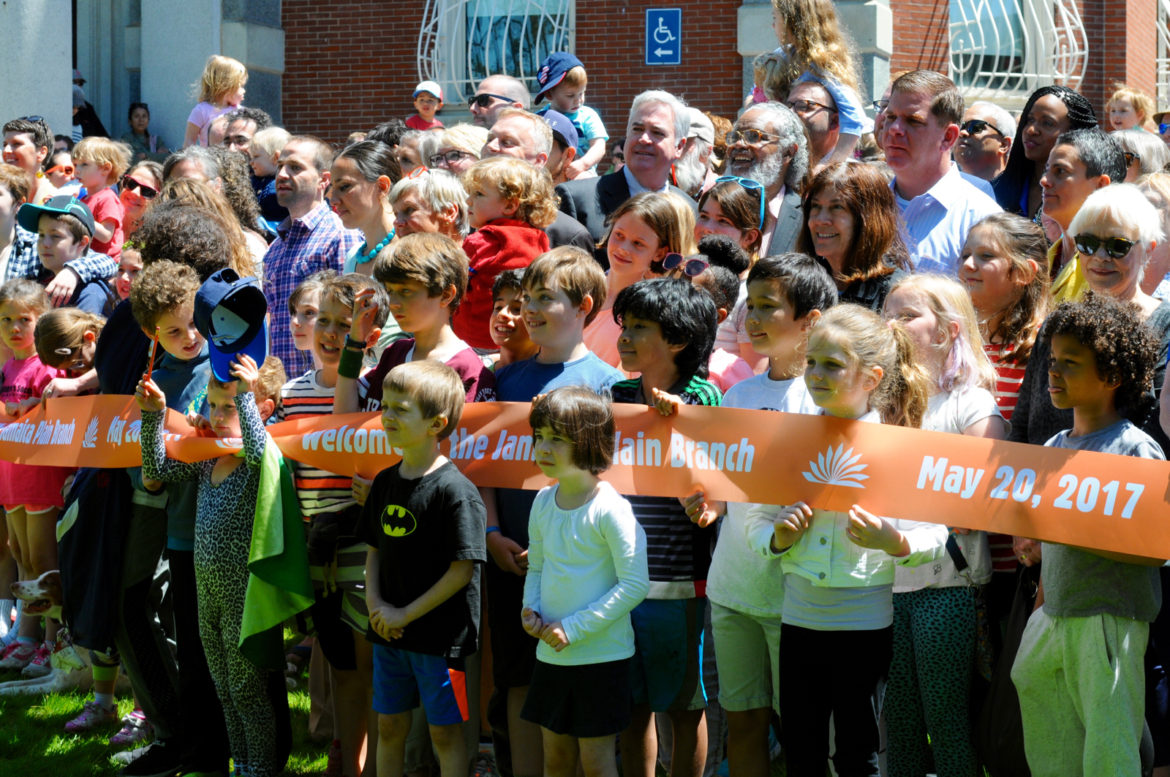 Mayor Marty Walsh and neighborhood kids get ready to cut the ribbon at the reopening of the JP Branch Library on Saturday, May 20, 2017.