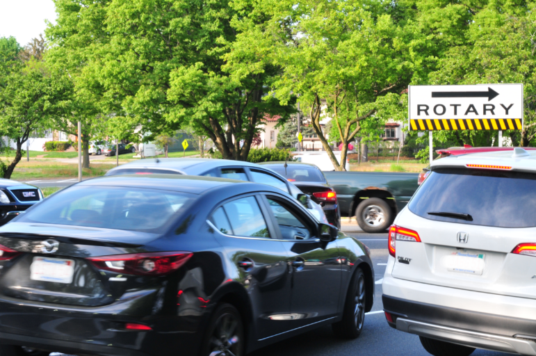 Drivers bunch together at Murray Circle on Monday, May 17, 2021. Note the Hyundai that is perpendicular to the new lane markings. (Visible license plates have been blurred.)
